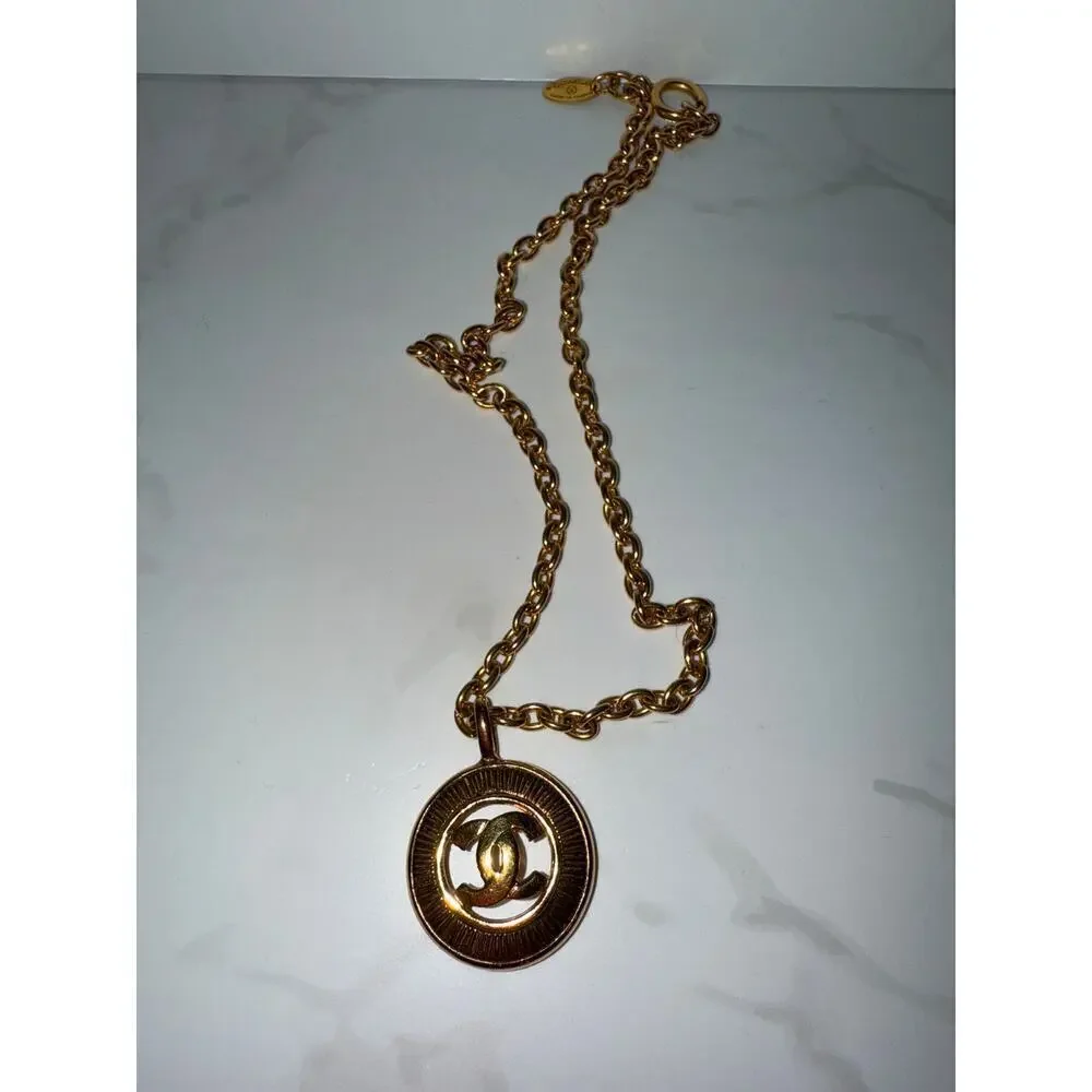Chanel CC Sunburst Round Pendant Necklace - Gold-Tone